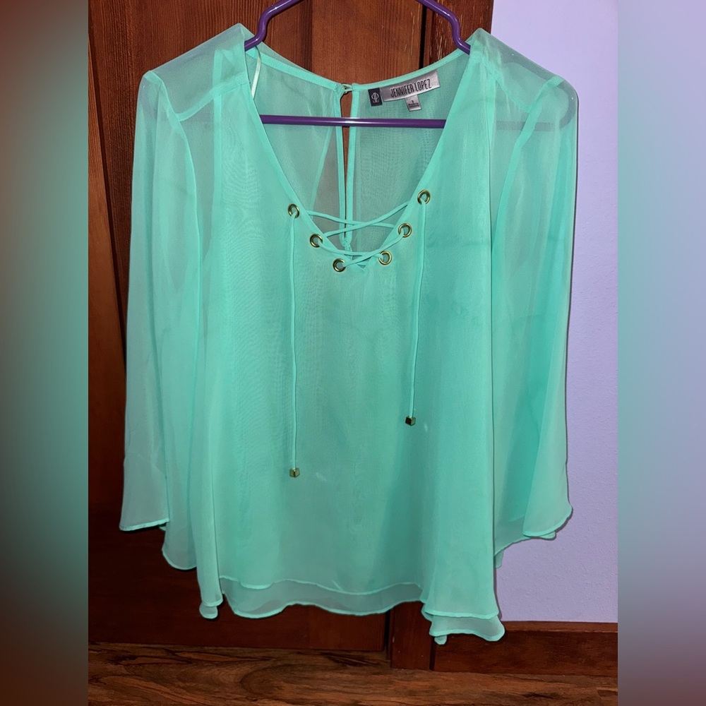 Super cute Jennifer Lopez fancy top with open back
